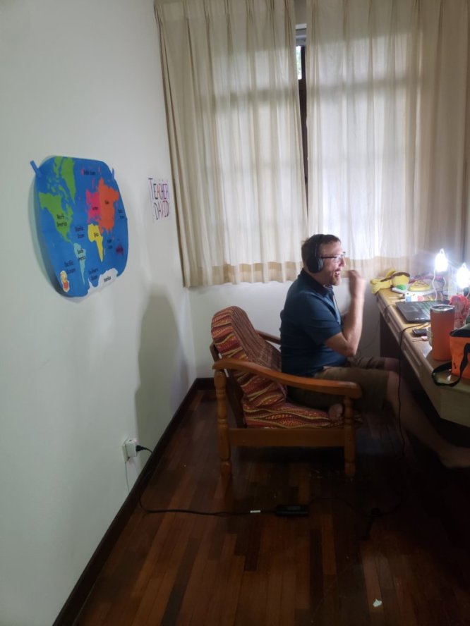 David tutoring an online student in a home office in Malaysia.