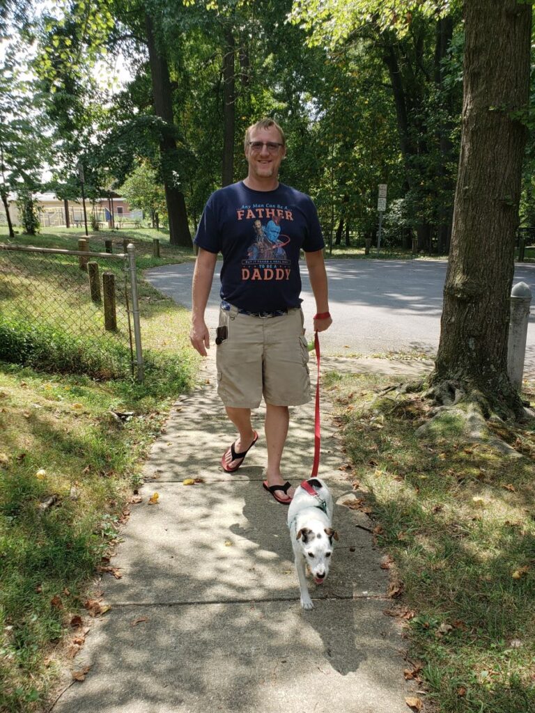 David walking a rescue dog.